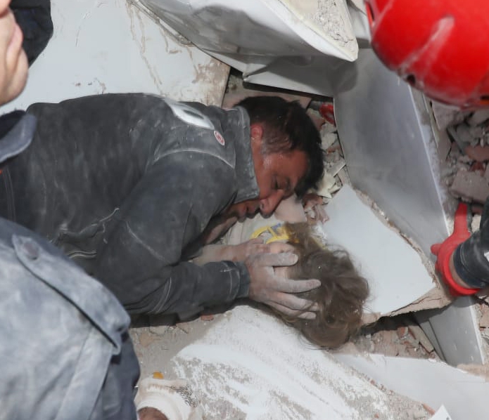 Rescuers heard a child scream and were able to locate her in the mass of destruction