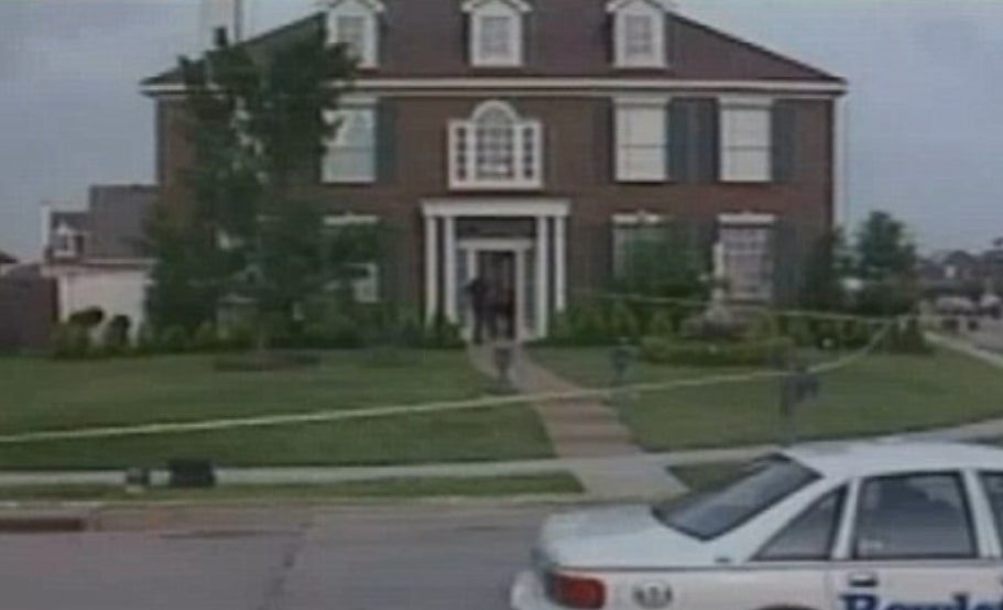 Crime scene tape outside the house
