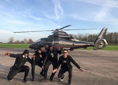 AJ has been known to get around swiftly in a helicopter