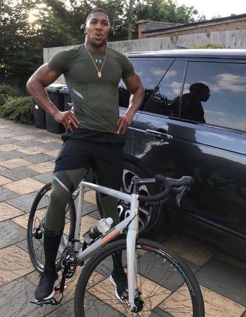 The generous champ even bought his mum a Range Rover