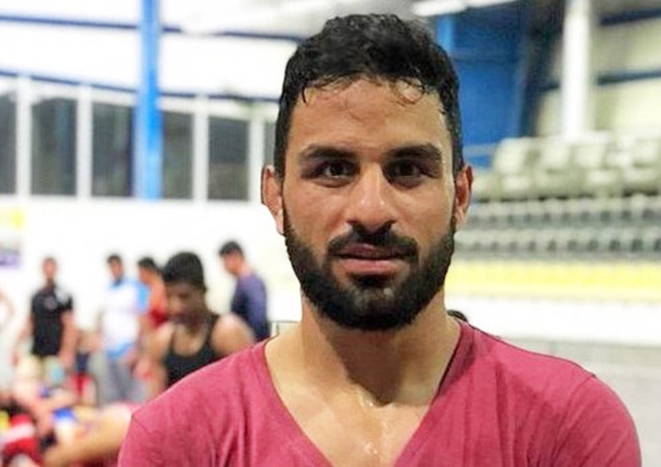 Portrait of Iranian wrestler Navid Afkari.