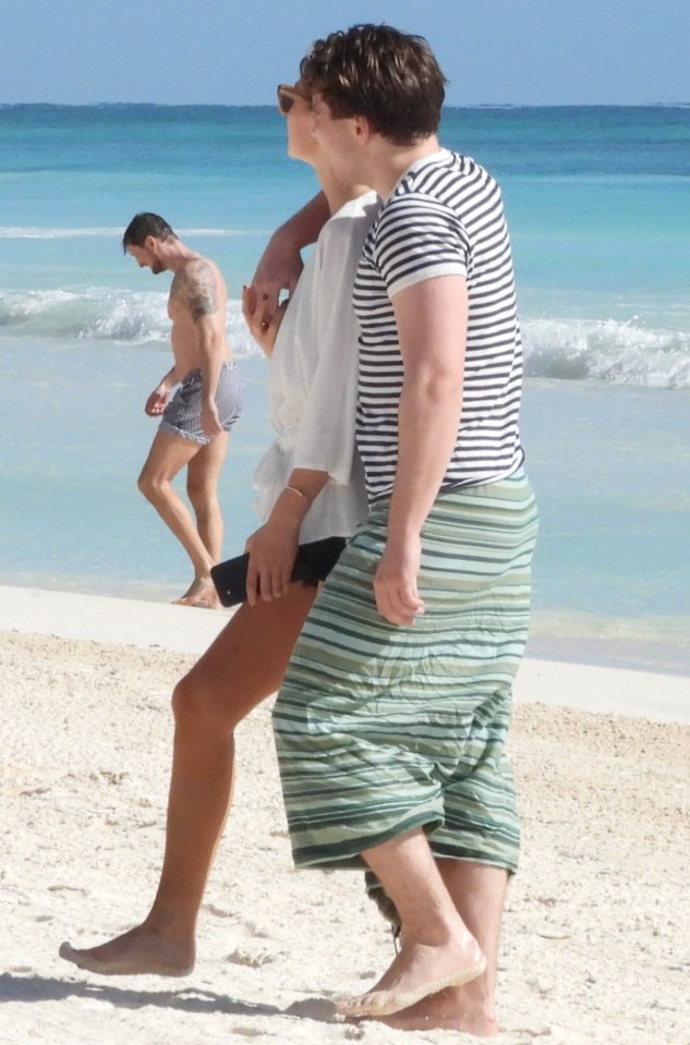 Rocco was seen with a mystery woman on holiday