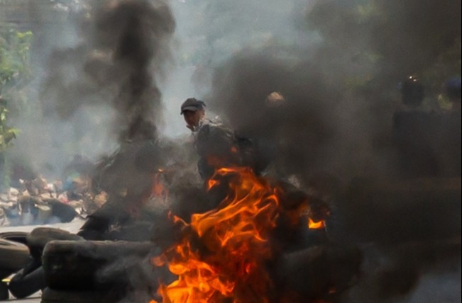 Streets were left burning during the protests