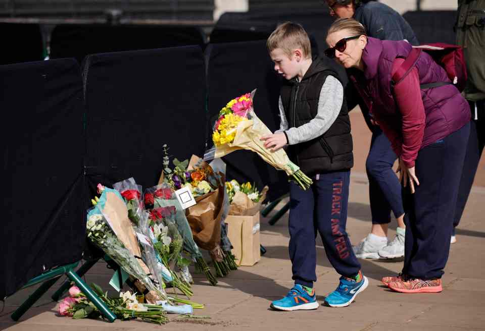 Brits wept as they laid flowers for the prince