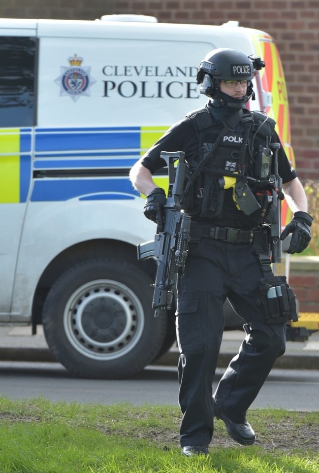 Armed Cleveland Police officer.
