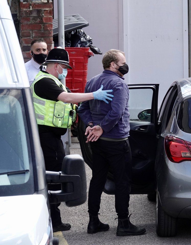 Defenndant Liam Norton glued his hand to a court table plunging a trial of Extinction Rebellion protesters into chaos