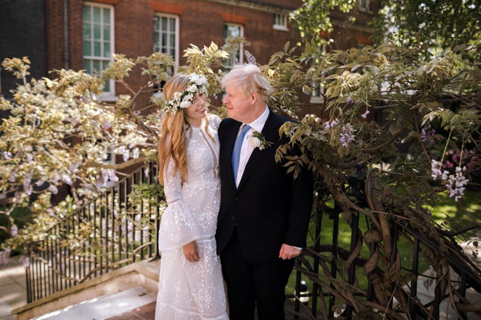 The pair looked besotted at their secret wedding - which took place yesterday at Westminster Cathedral