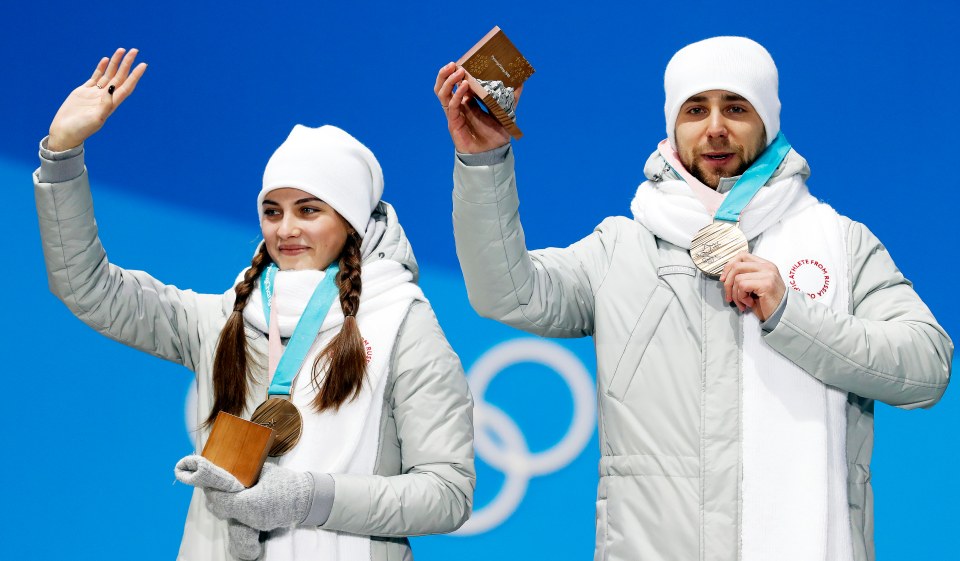 ROC athletes dressed in grey sweatsuits for Olympic ceremony at the 2018 Winter Olympic games in Pyeongchang