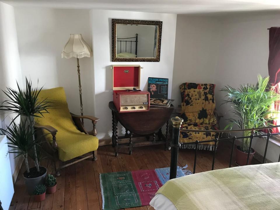 Guests can enjoy the vinyl player in the bedroom