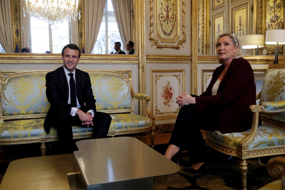 French President Emmanuel Macron and Marine Le Pen (pictured together) both suffered bitter election defeats this evening