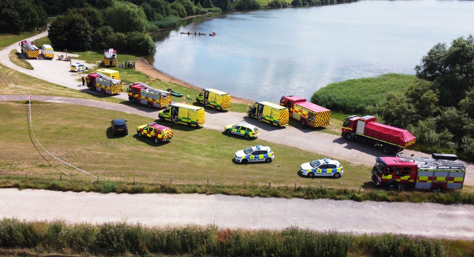 Emergency services lined up around the shore of Pugneys Country Park lake