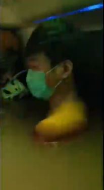 Footage shows passengers stuck in shoulder-deep floodwater on an underground train