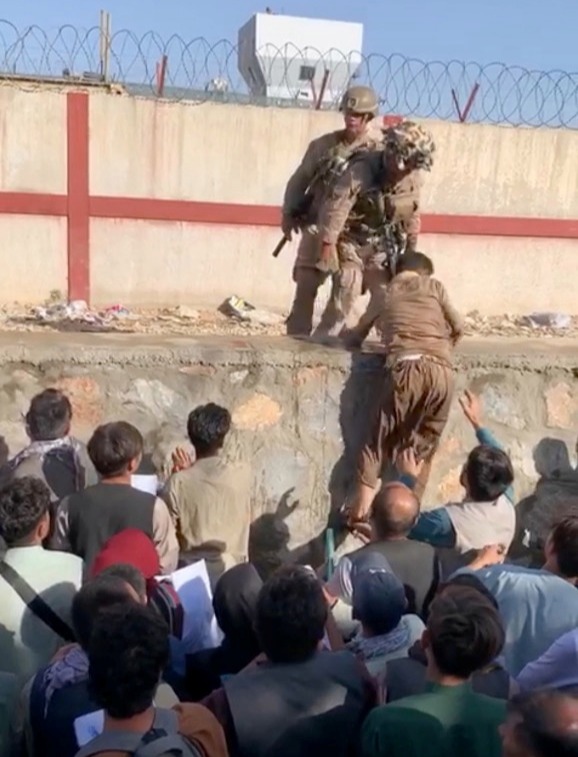 Soldiers will drag people out of the canal if they have the correct documents