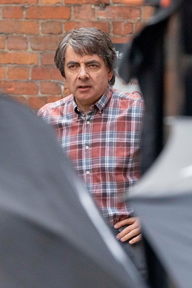 Rowan Atkinson, 66, looked worlds away from Mr Bean on the set of his new Netflix series Man Vs Bee