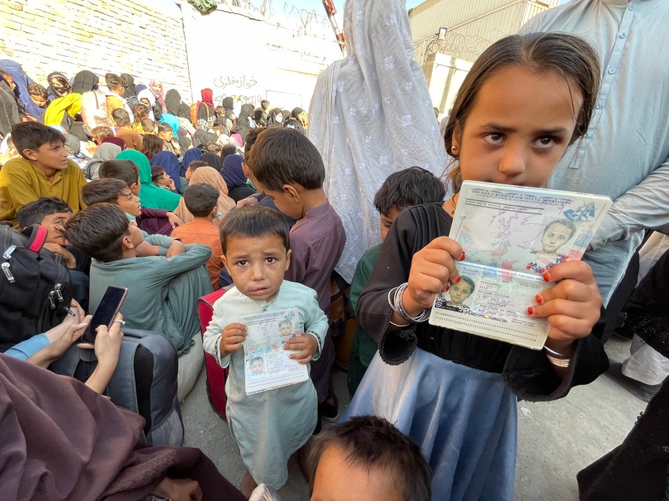 Sidiq Marofahail’s children Asia and Twid pictured on The Sun’s front page clutching their passports just hours before crowds were targeted by what appears to be a suicide bomber