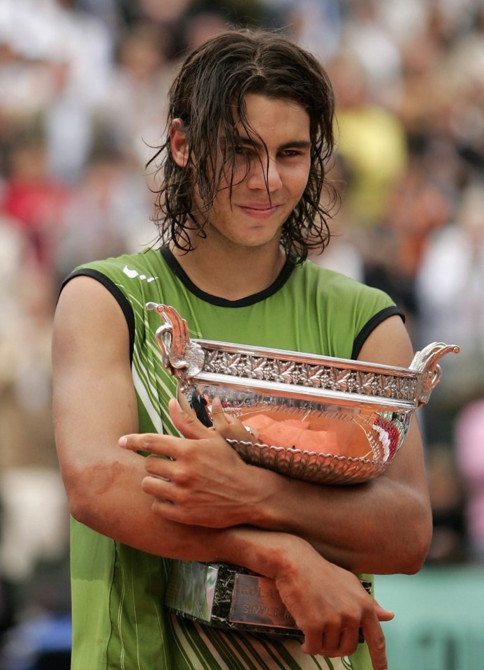 Rafael Nadal hugs his first French Open title in 2005