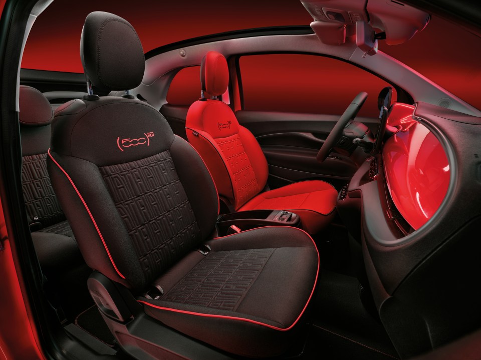 The 500e has a red driver’s seat and a red accelerator pedal