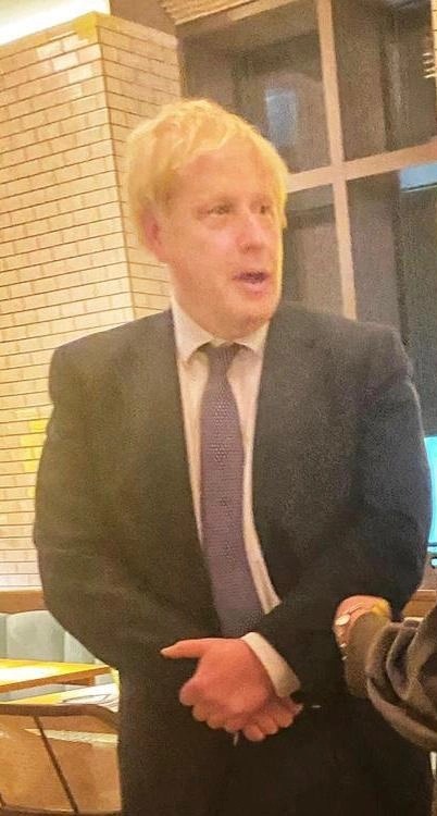 A source said:  'At one point, Boris went out to circulate with other parties in the main dining room. He wasn’t wearing a mask at times and he spoke to a couple of customers while standing at their table'
