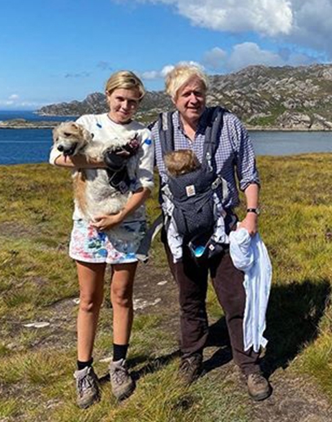 The couple pictured with Wilfred and dog Dilyn