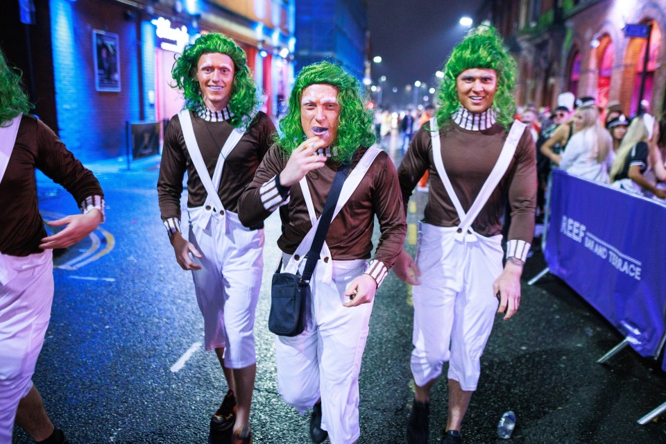 A group of lad dress as Oompa Loompas in Wigan, Lancashire