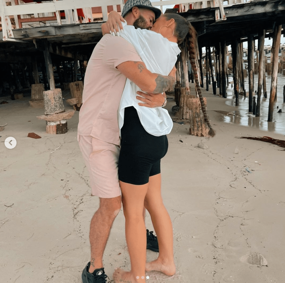Harry gives Katie a huge hug and the couple kiss