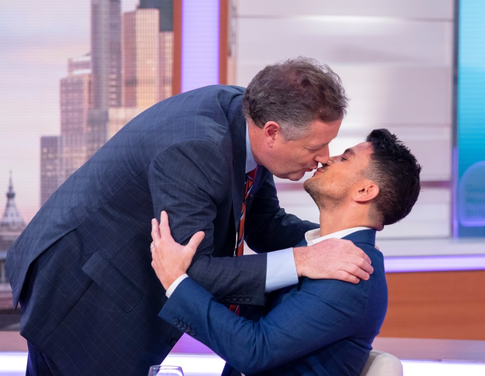 Pucker up! Piers and Peter Andre shared a kiss on Good Morning Britain