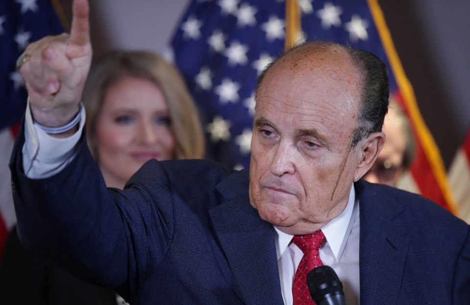 Giuliani was famously caught with his hair due running down his face
