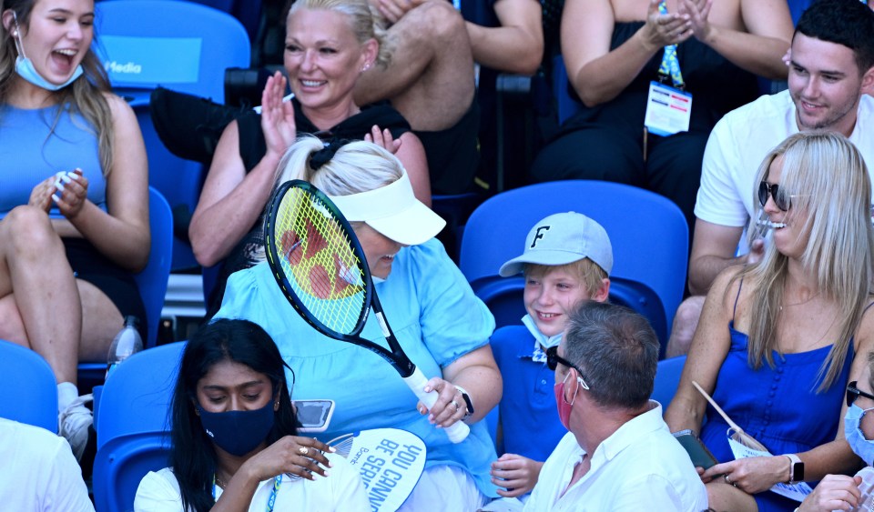 The young fan's face brightened up as he received his special gift