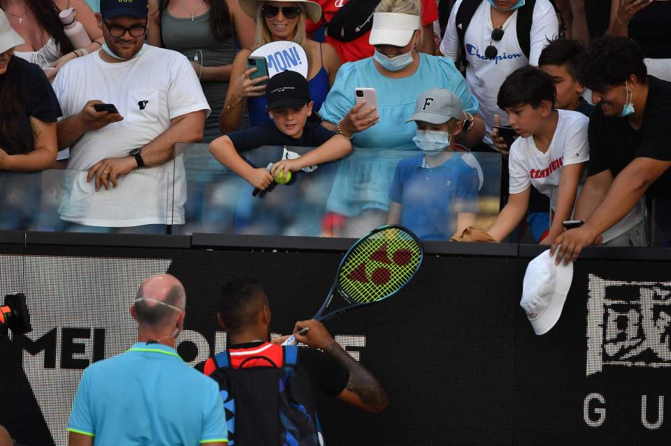 Nick Kyrgios passed his racquet into the crowd