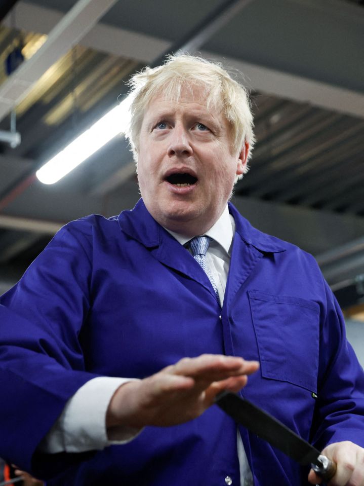 The PM pictured on a trip to a college in Manchester