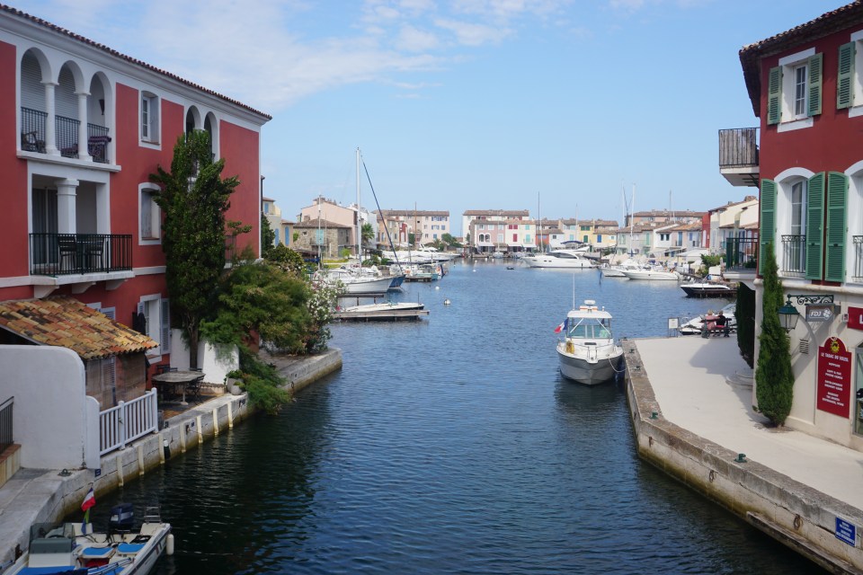 Port Grimaud boasts Venetian-inspired bridges that connect a network of canals lined with boutiques and ­restaurants