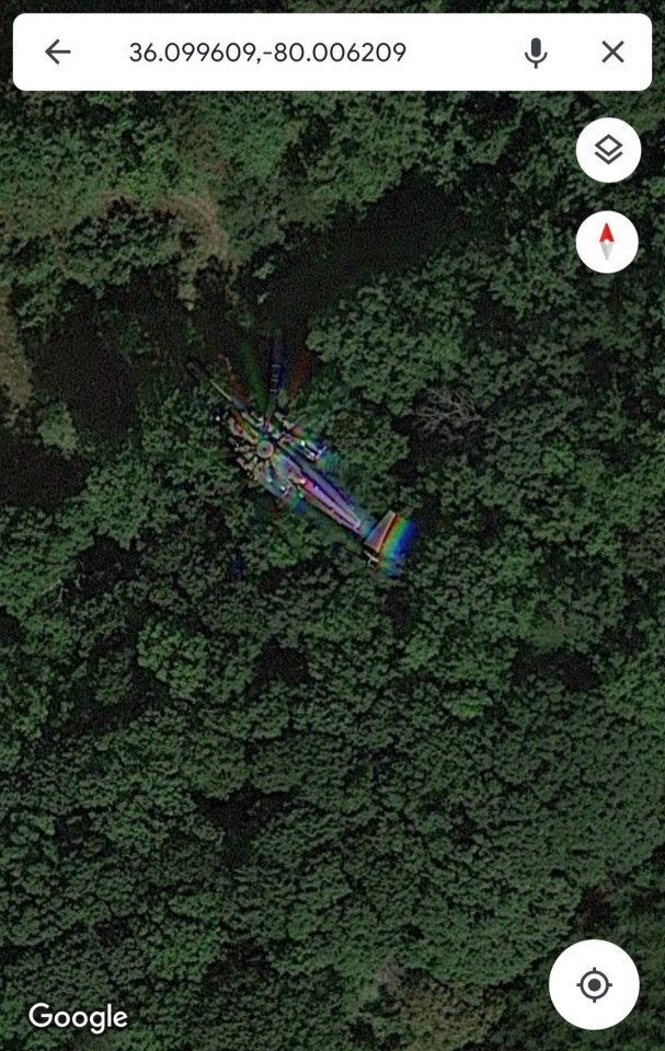 A helicopter captured in mid-flight on Google Maps