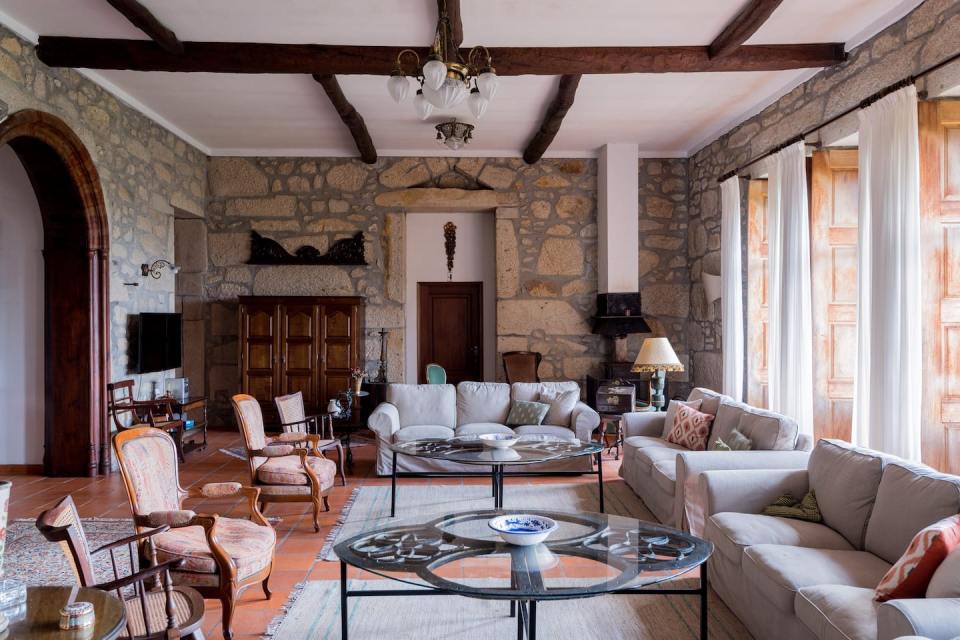 There are three living rooms, two dining rooms, a huge kitchen and a chapel