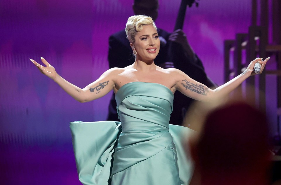 Lady Gaga says she is having to think up ways to explain away her more X-rated songs for when she starts a family