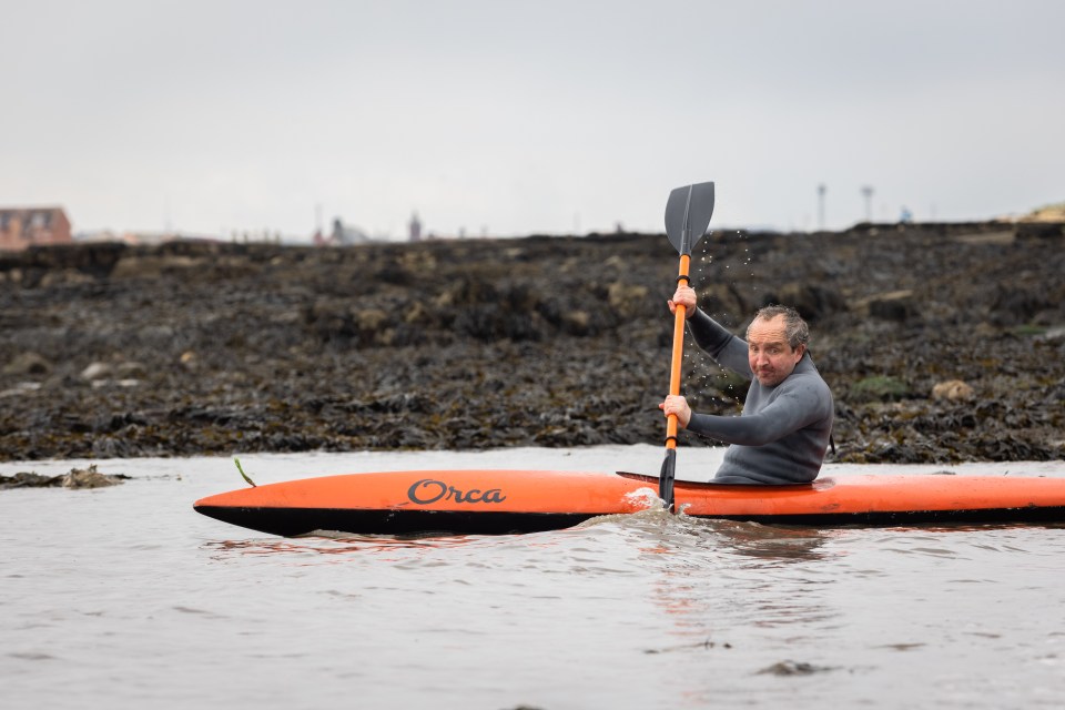 Eddie on the water playing scammer John