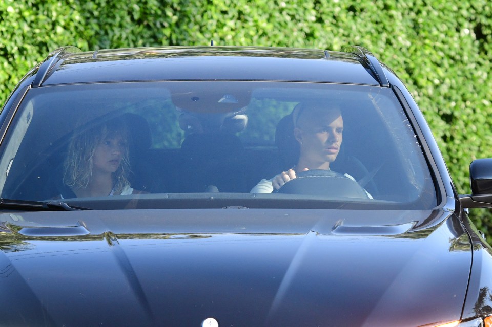 Romeo arriving to Friday's rehearsal dinner with girlfriend Mia
