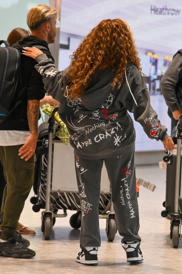 Jesy's tracksuit was covered in graffiti