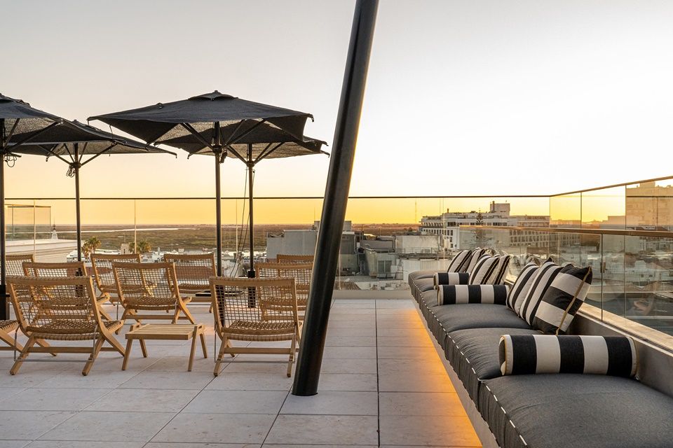 Unwind in the evening on a peaceful rooftop bar where you can enjoy the sunset