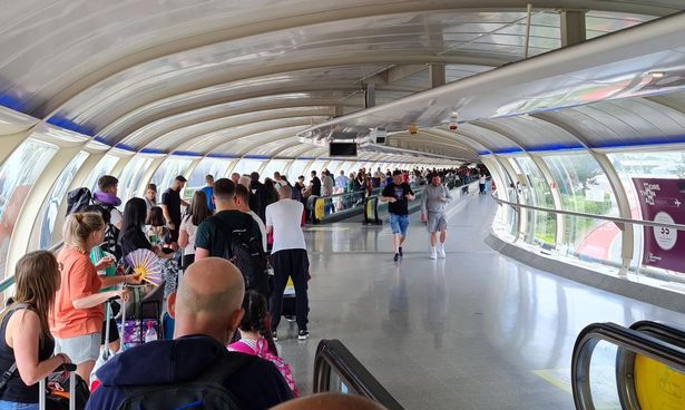 ‘Hundreds’ of TUI passengers received a text from the holiday giant that their trips were cancelled – after a nightmare eight-hour wait in Manchester
