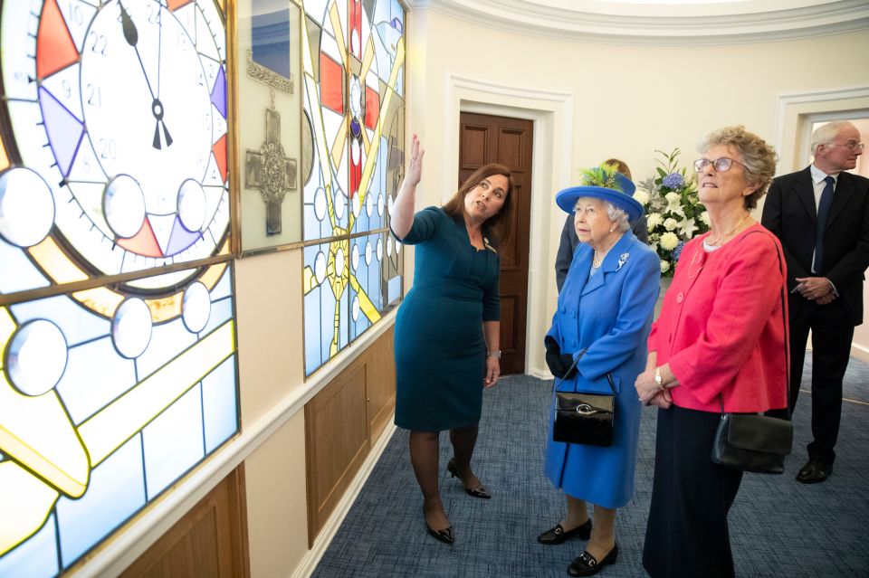 Jo meets the Queen at the unveiling of a window at the  RAF Club, dedicated to female pilots