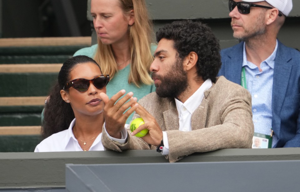 The pair looked in good spirits as they returned to Centre Court for another date with the No1 seed