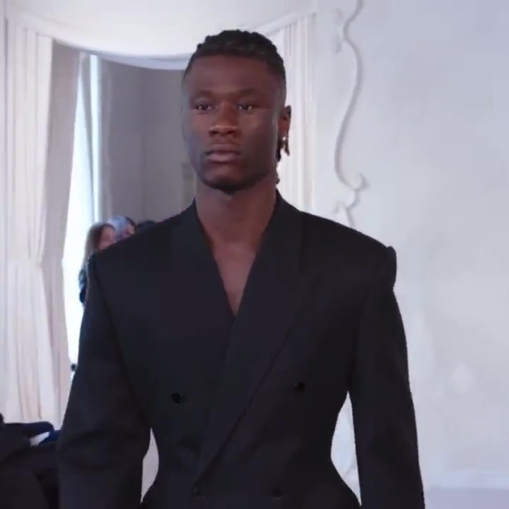 Camavinga looked every inch the professional model at Paris Fashion Week