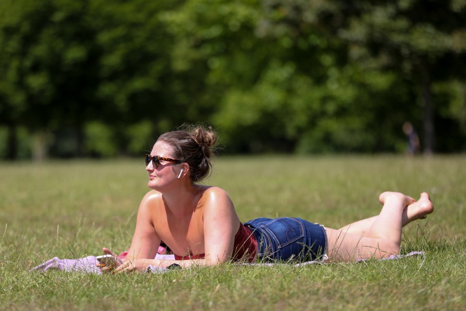 A woman relaxing in Finsbury Park in north London