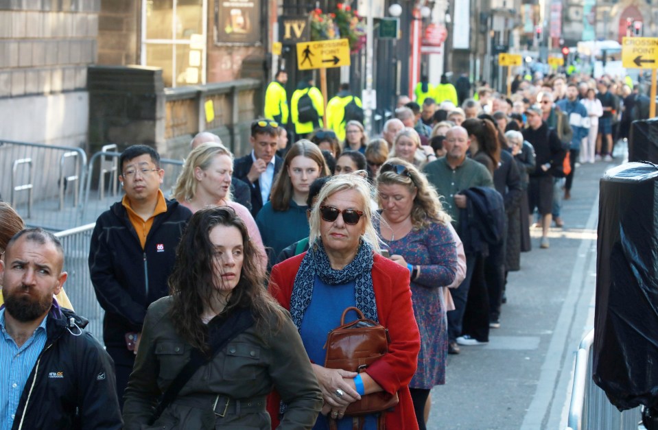 People queue outside St Giles’ Cathedral as the Queen's coffin lies in Edinburgh