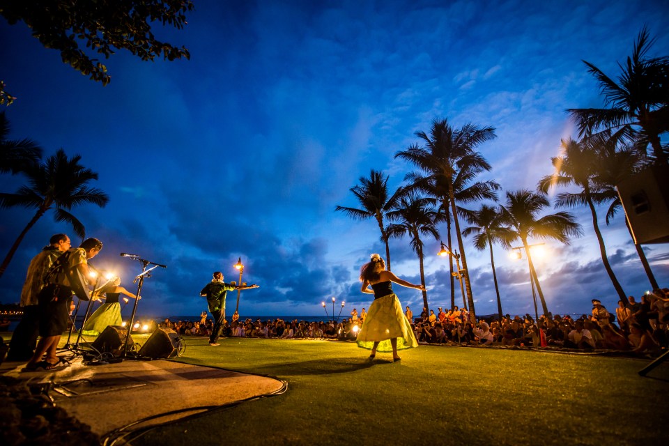 At the Fern Grotto, a secluded spot popular with couples tying the knot, there's hula and singing