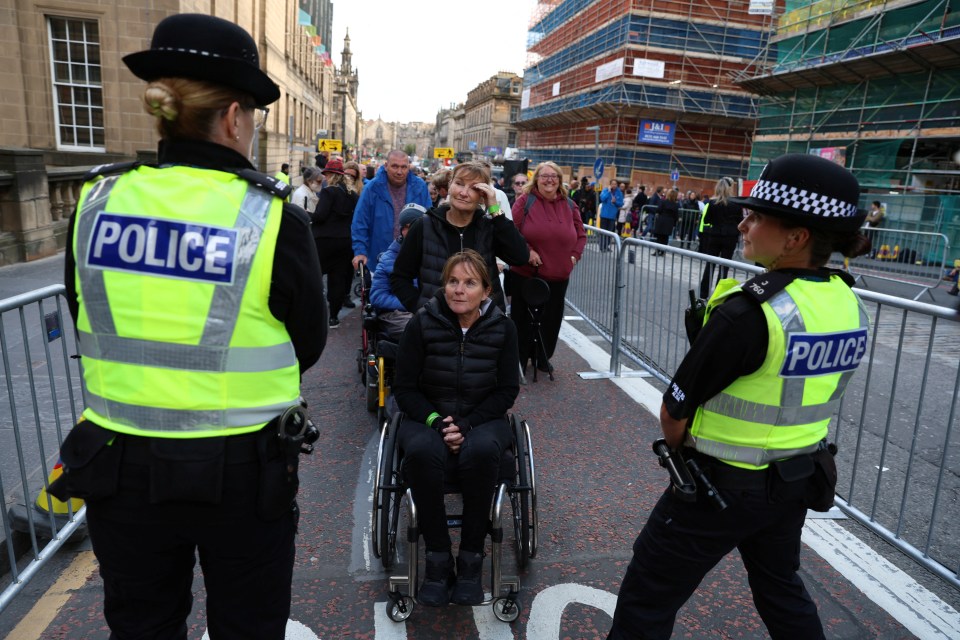 Alison Evans and Sharon Baum, of Derbyshire, queue to visit the Queen lying in state