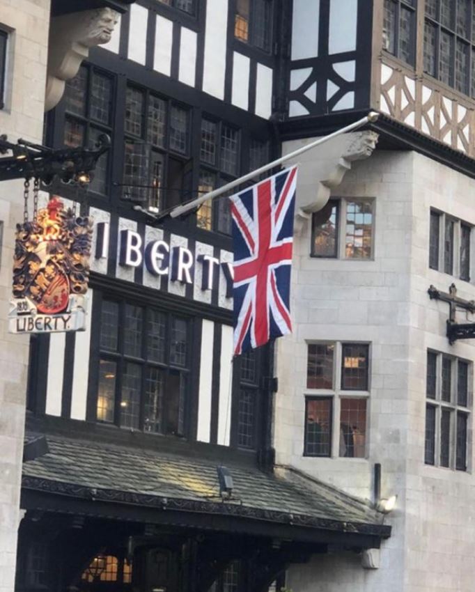 Liberty London shared a picture of the Union Jack flying at half mast outside their store