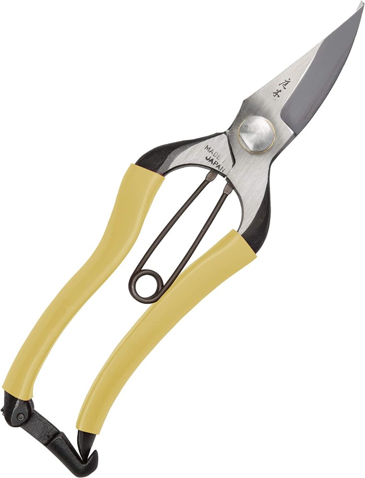 Japanese pruning shears with yellow handles.