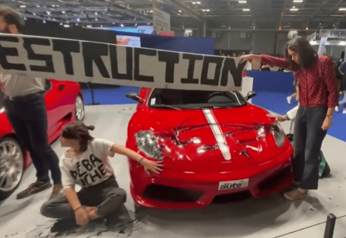 They also sprayed the supercars with black paint
