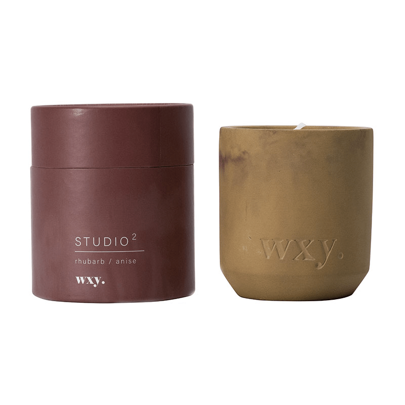 WX Studio 2 rhubarb/anise candle in concrete container.